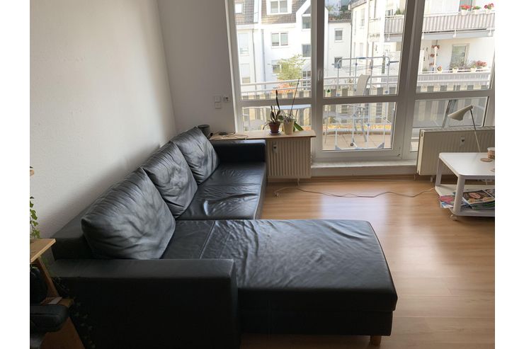 Ausziehbares dunkles Ledersofa - Sofas & Sitzmbel - Bild 1